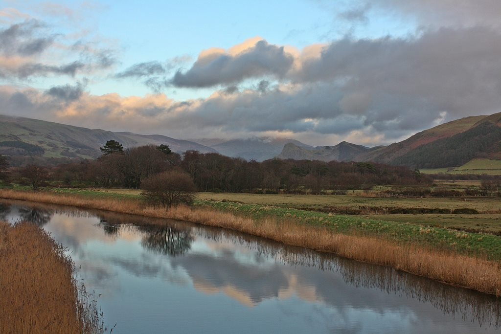 The Dysynni valley, a small stream trickles through with hills in the distance.