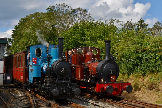 Two steam trains passing at Pendre yard.