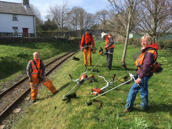 Four people with the new strimmers just past Rhydy bridge.