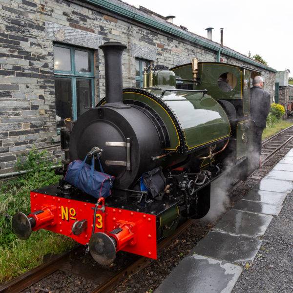 Sir Peter's taxi service with bag hanging off the smokebox handle